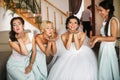 The happinest bride with bridesmaids