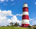 Happisburgh Lighthouse under a blue sky