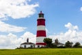 Happisburgh lighthouse in front of crops.