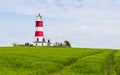 Happisburgh lighthouse on top of a hill Royalty Free Stock Photo