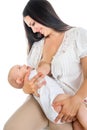 Happu mother breast feeding her infant smiling baby Royalty Free Stock Photo