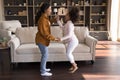 Happy active mom and daughter kid dancing to music Royalty Free Stock Photo