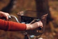 Happy active young woman riding bicycle in autumn park Royalty Free Stock Photo