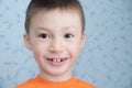 Happy Adorable boy at 7 age portrait closeup, Caucasian child, second dentition concept Royalty Free Stock Photo