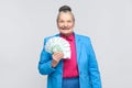 Happy adult woman holding many euro Royalty Free Stock Photo