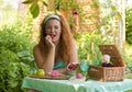 Happy adult woman resting in garden outdoors Royalty Free Stock Photo