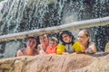 Happy adults and children in a water park Royalty Free Stock Photo