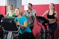 Adults in gym working out at group class Royalty Free Stock Photo