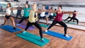 Happy adults having group fitness class Royalty Free Stock Photo