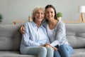 Happy affectionate two generation women grandmother and granddaughter portrait Royalty Free Stock Photo