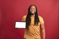 African American man shows the tablet Royalty Free Stock Photo