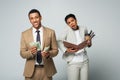 happy african american businessman counting dollars