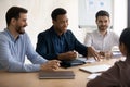 Happy african american businessman holding negotiations meeting. Royalty Free Stock Photo