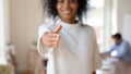 Happy African American businesswoman extending hand at camera, offering handshake Royalty Free Stock Photo