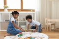 Happy african american children playing at home. Royalty Free Stock Photo