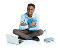 Happy african american college student with laptop, books and bo Royalty Free Stock Photo
