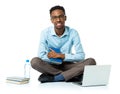 Happy african american college student with laptop, books and bo Royalty Free Stock Photo