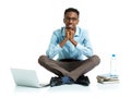 Happy african american college student sitting with laptop on wh Royalty Free Stock Photo