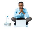 Happy african american college student sitting with laptop on white Royalty Free Stock Photo