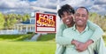 Happy African American Couple In Front of Beautiful House and So Royalty Free Stock Photo