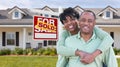 Happy African American Couple In Front of Beautiful House and So Royalty Free Stock Photo