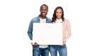 happy african american couple holding blank banner and smiling at camera Royalty Free Stock Photo