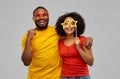 Happy african american couple with party props Royalty Free Stock Photo