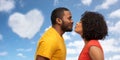 Happy african american couple reaching for kiss