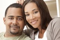 Happy African American Couple Sitting At Home Royalty Free Stock Photo