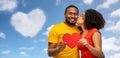 Happy african american couple wit red heart kiss Royalty Free Stock Photo