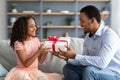 Happy african american dad and cute daughter celebrating Fathers day Royalty Free Stock Photo
