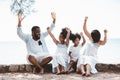 Happy African American family, Father, Mother, Two daughter enjoying and funning together in outdoor park seaside. Royalty Free Stock Photo
