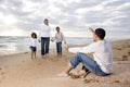 Happy African-American family of four on beach Royalty Free Stock Photo