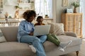 Happy african american family, mother and child looking at computer screen while talking video call Royalty Free Stock Photo