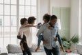 Happy african american family playing catch up at home. Royalty Free Stock Photo