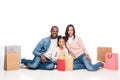 happy african american family with shopping bags smiling at camera Royalty Free Stock Photo
