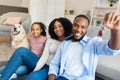 Happy African American family showing keys of their new apartment Royalty Free Stock Photo