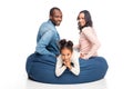 happy african american family sitting on bean bag chair Royalty Free Stock Photo