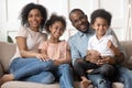 Happy cute black family of four portrait. Royalty Free Stock Photo