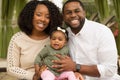 Happy African American family with their baby. Royalty Free Stock Photo