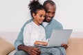 happy african american father and daughter using laptop Royalty Free Stock Photo