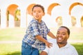 Happy African American Father and Mixed Race Son At The Park Royalty Free Stock Photo