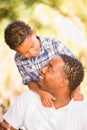 Happy African American Father and Mixed Race Son Playing At The Park Royalty Free Stock Photo