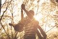 African American father in park carrying daughter on shoul Royalty Free Stock Photo