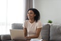 Happy black woman laughing using laptop typing Royalty Free Stock Photo