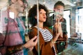 Happy african american female leader holding negotiations meeting with friendly diverse colleague Royalty Free Stock Photo