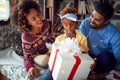 Happy African American girl celebrate Christmas wuth her family Royalty Free Stock Photo