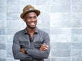 Happy african american guy smiling with arms crossed Royalty Free Stock Photo