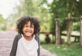 Happy African american little boy kids children joyfully cheerful and laughing. Concept of happiness. Royalty Free Stock Photo