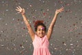 Happy black small girl at white studio background Royalty Free Stock Photo